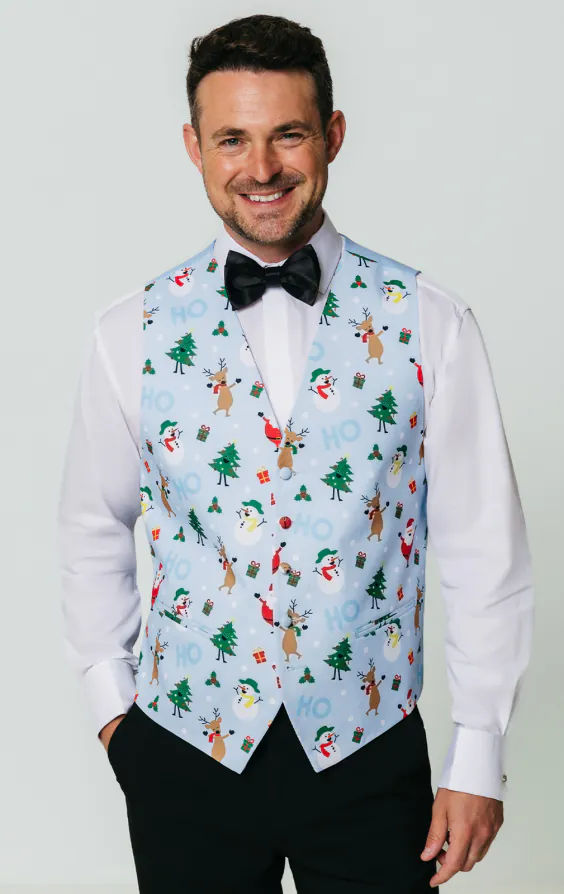 Gilet de Noël festif bleu clair et enneigé Gilet de Noël festif bleu clair et enneigé