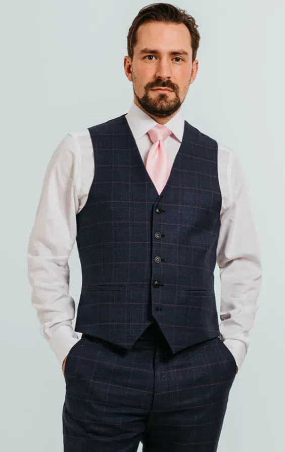 Gilet bleu marine à carreaux rose