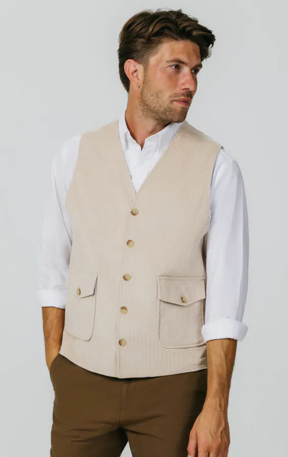 Gilet en velours côtelé beige avec poches plaquées Gilet en velours côtelé beige avec poches plaquées