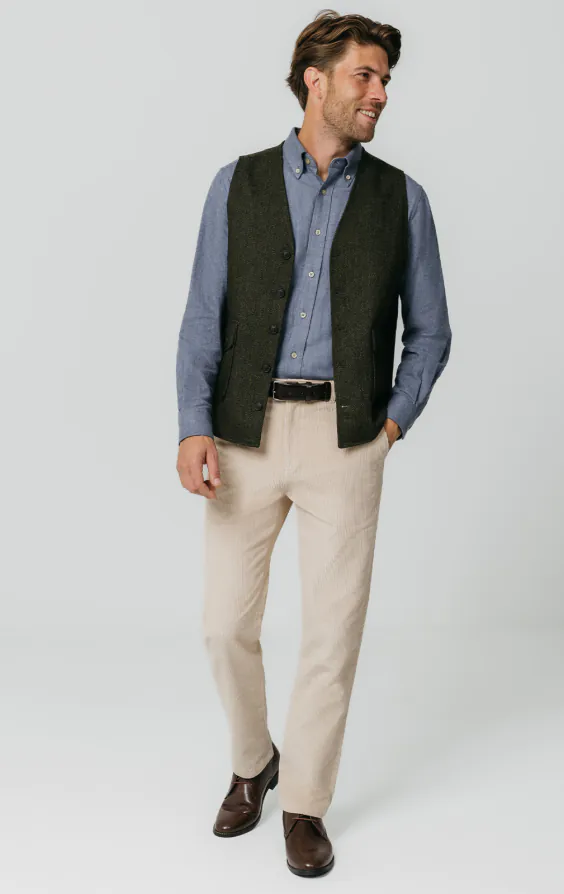 Gilet en tweed vert à chevrons avec poches plaquées - photo 1 Gilet en tweed vert à chevrons avec poches plaquées - photo 1