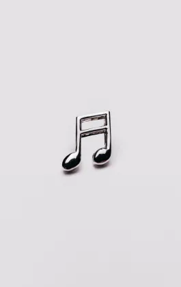Badge de revers en forme de note de musique argentée