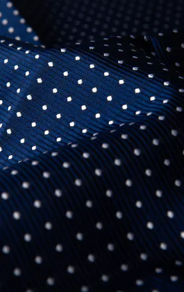 Pochette bleue à pois blancs