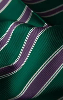 Pochette verte à rayures violettes