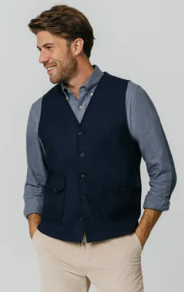 Gilet en tweed bleu marine à chevrons avec poches plaquées